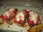 Pork Parmigiana in baking dish